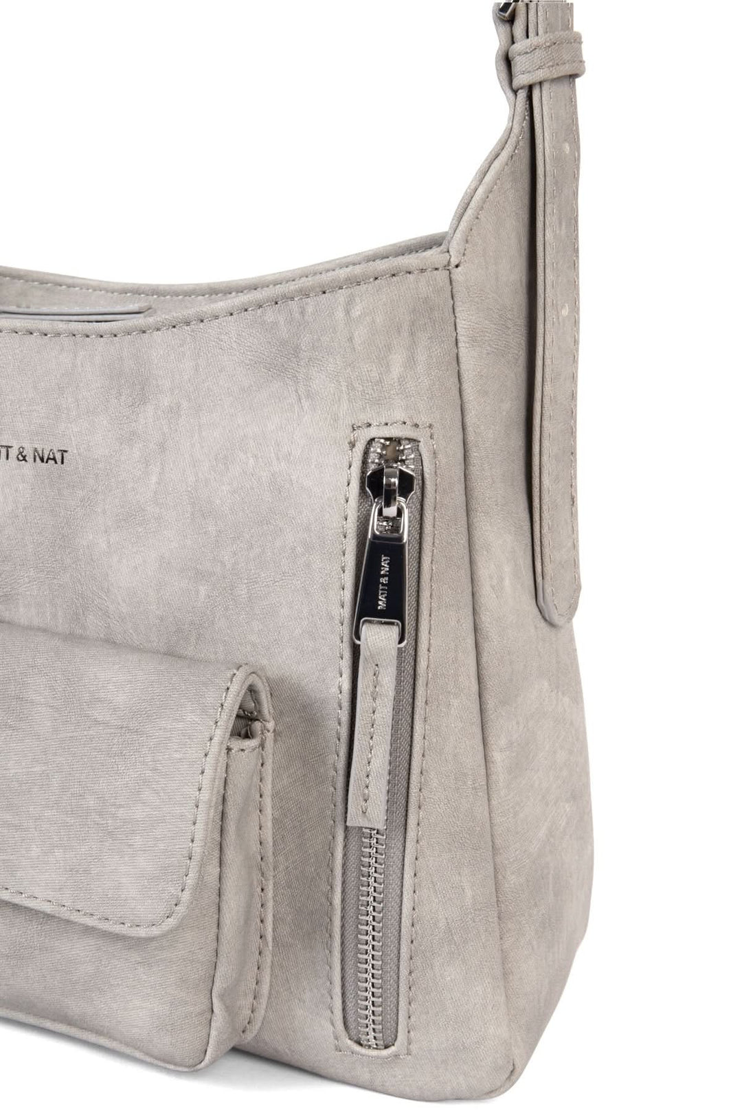 Sac à mains Rain en gris, avec poche zippée et bretelle ajustable pour confort et style.