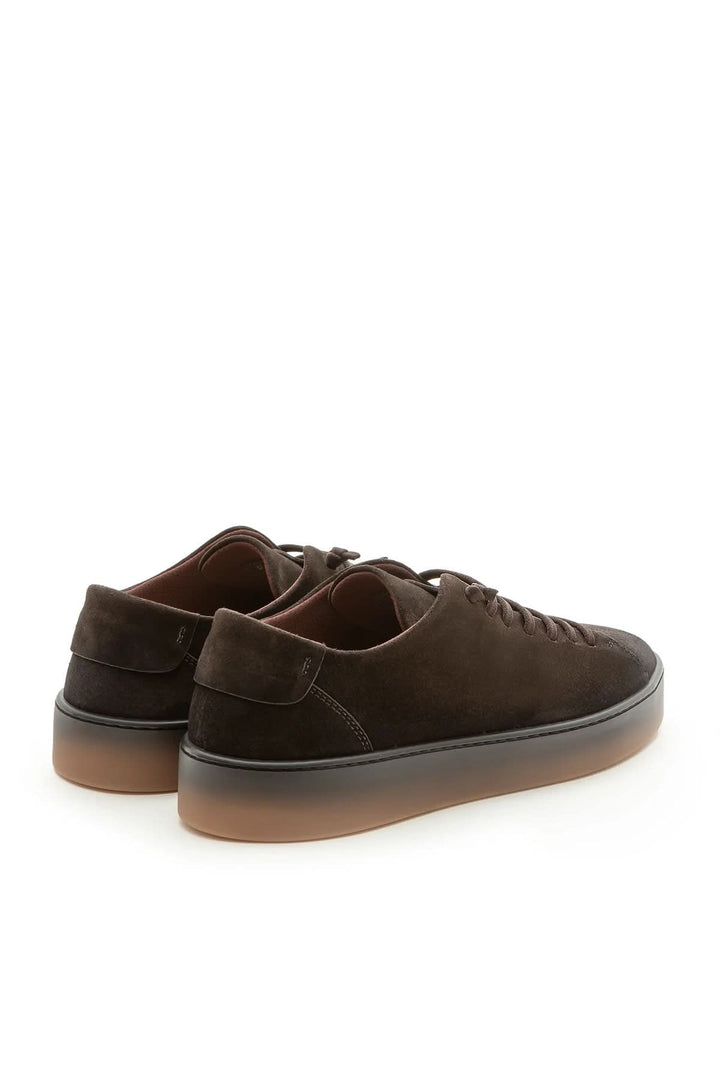 Sneaker homme cuir veau finition travaillée, vue arrière, marron, semelle haut de gamme, artisanat italien, chaussures élastiques pratiques.