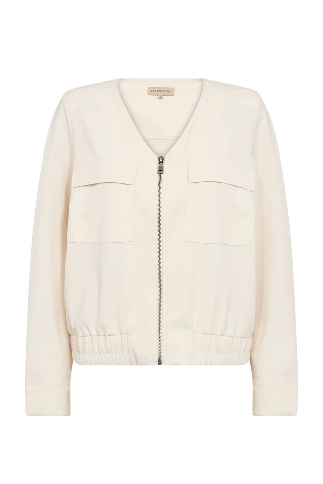 Veste zipée blanche avec col en V, poches plaquées et ourlet élastique, idéale pour tenues décontractées et professionnelles.
