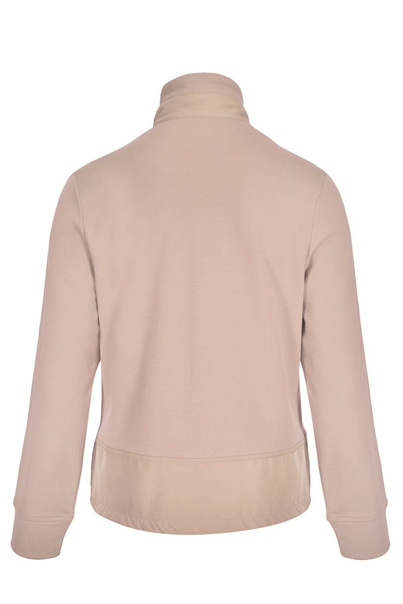 Veste zippée manches longues beige avec col montant, vue arrière, coupe droite, moderne et polyvalente pour tenue décontractée ou habillée.