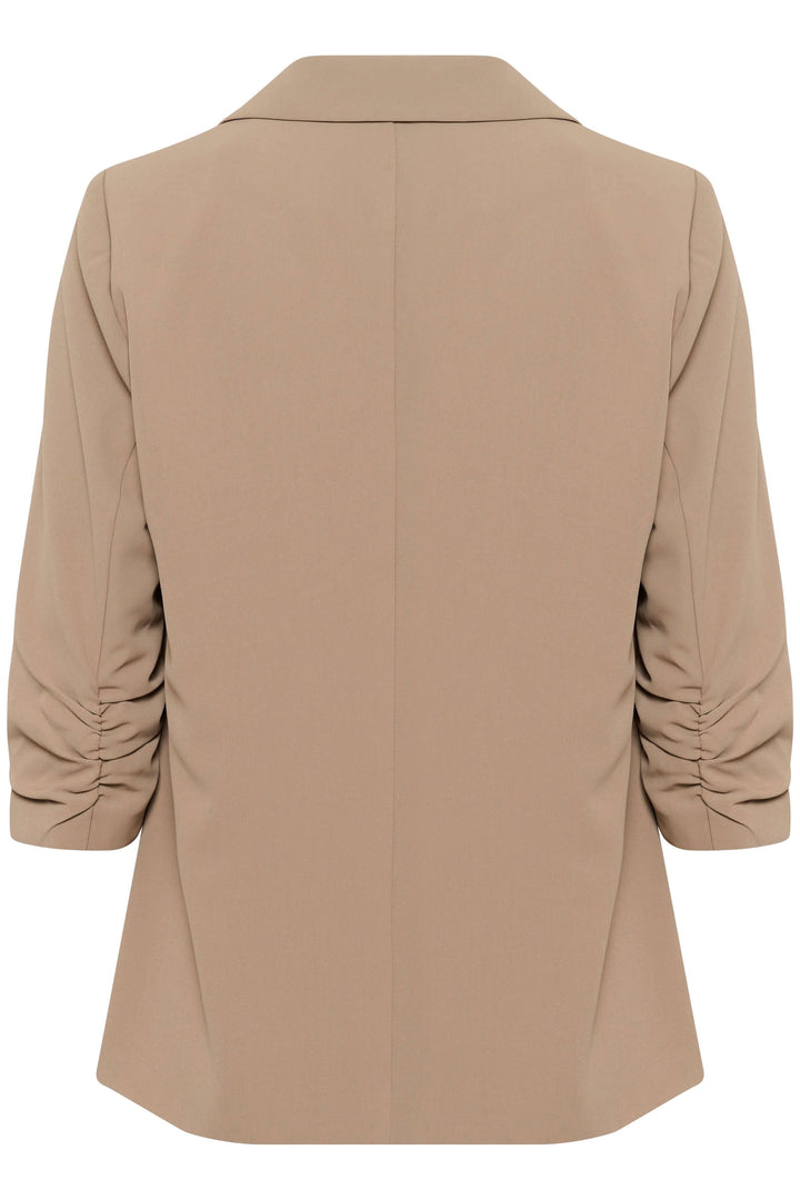 Veston à la coupe décontractée, avec col tailleur, manches froncées et tissu souple, vue arrière.