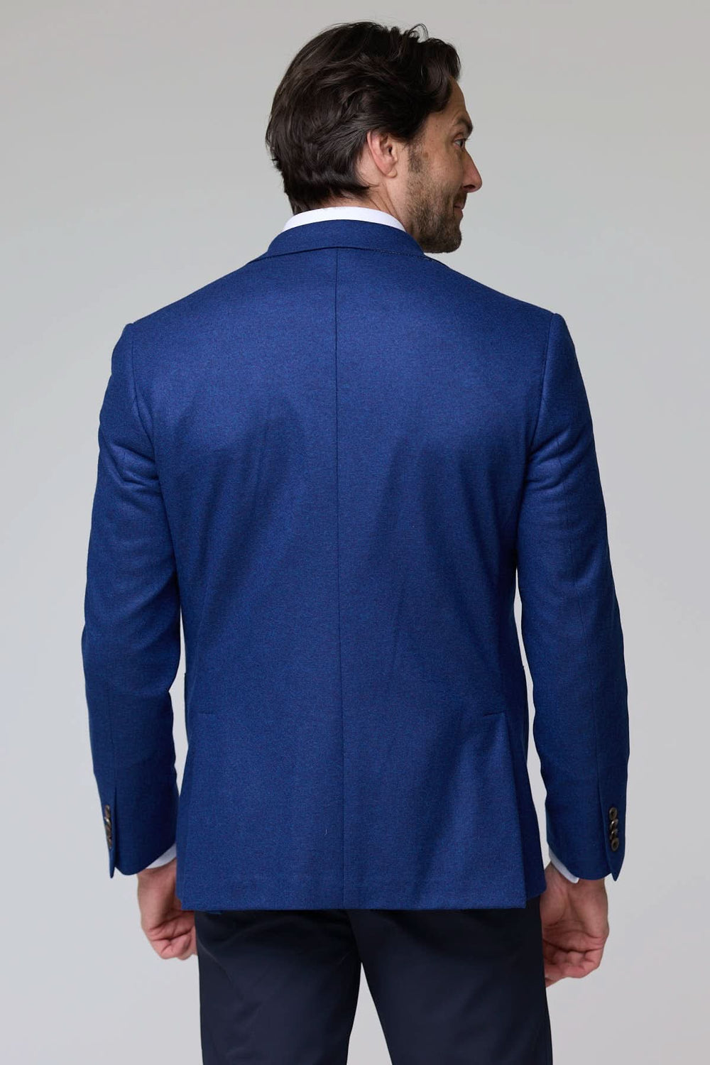 Veston Carvin en laine à deux boutons vu de dos avec col à revers classique et coupe moderne, idéal pour occasions formelles.