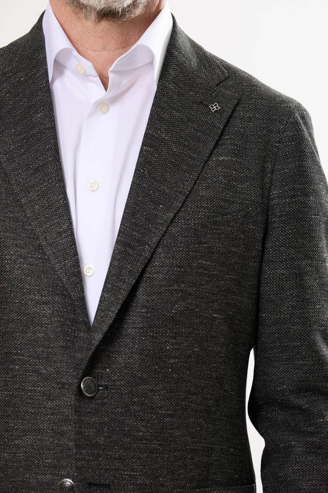 Veston noir texturé avec revers cranté, parfait pour élégance décontractée et tenues de transition.