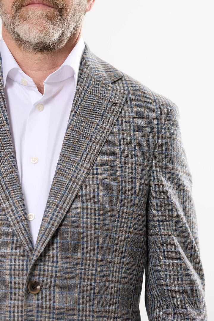 Veston à motif prince-de-galles en tissu raffiné, coupe semi-ajustée, idéal pour occasions habillées.