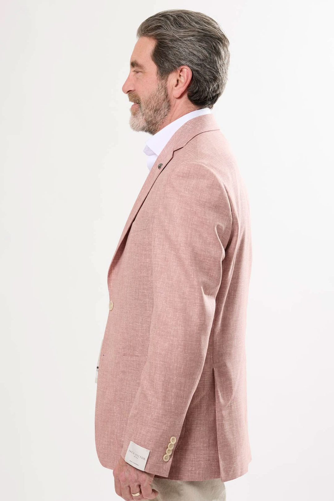 Veston texturé moderne, léger, rose, idéal pour les occasions festives ou professionnelles décontractées.