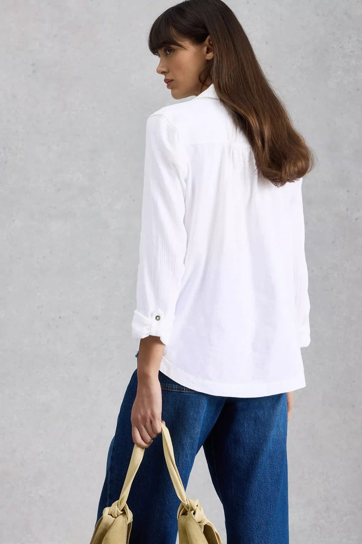 Front view of the white button-front blouse with crinkled texture White Stuff for women with collar - Valérie Simon