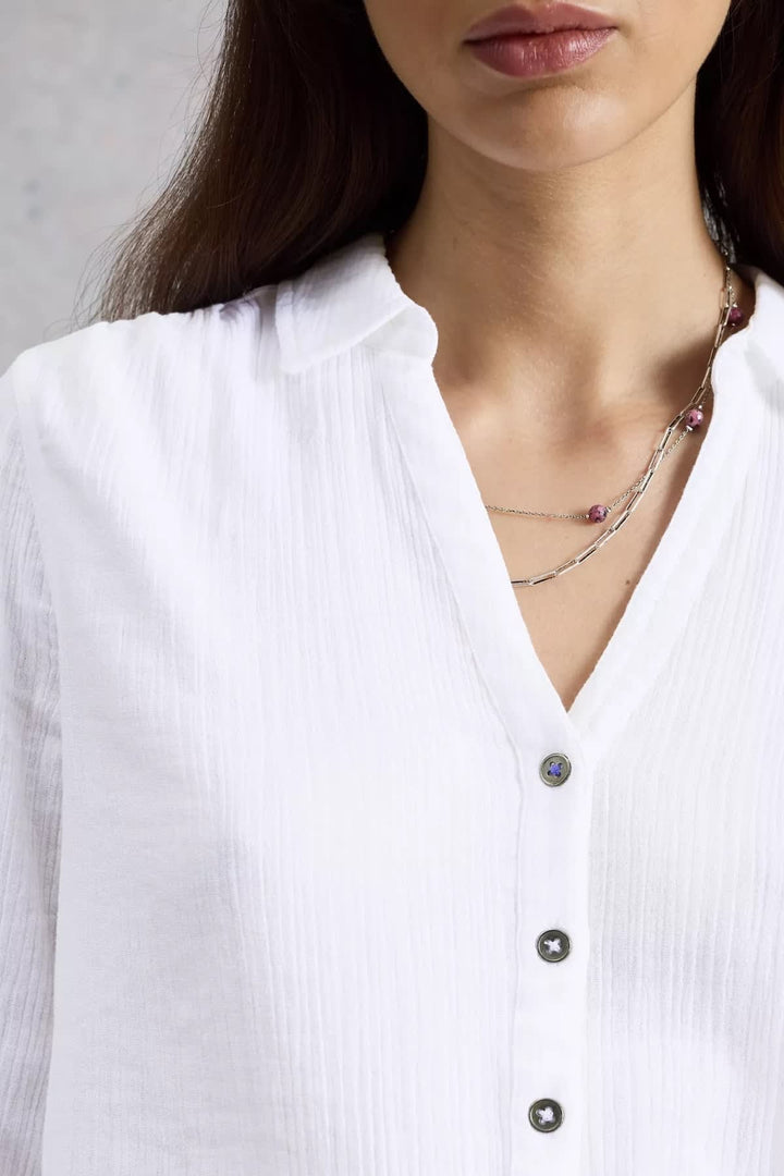 Front view of the white crinkled blouse White Stuff for women with buttons and shirt collar - Valérie Simon