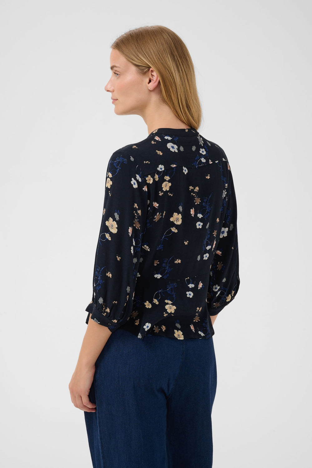Women's floral three-quarter sleeve blouse, front view Part Two