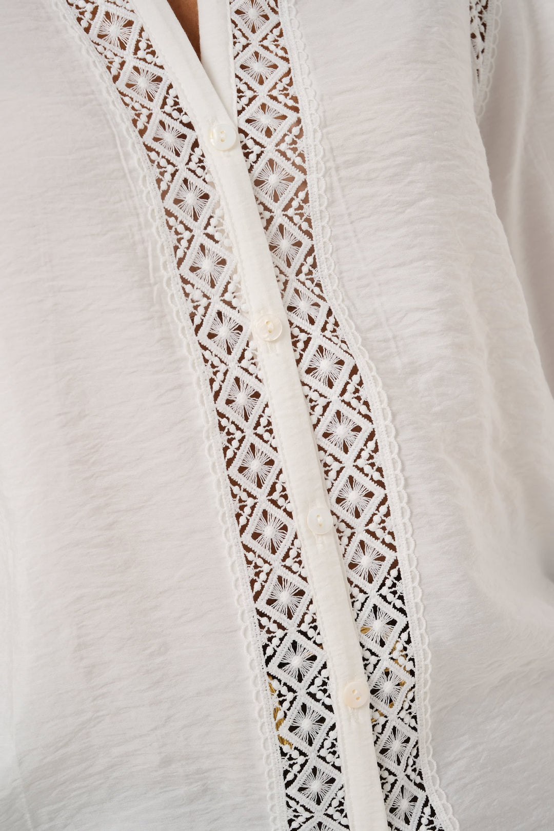 Front view of a collarless Kaffe women&