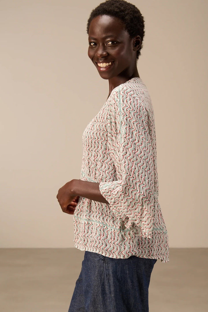 Detailed view of the Nile beige collarless printed blouse for women with floral patterns - Valérie Simon