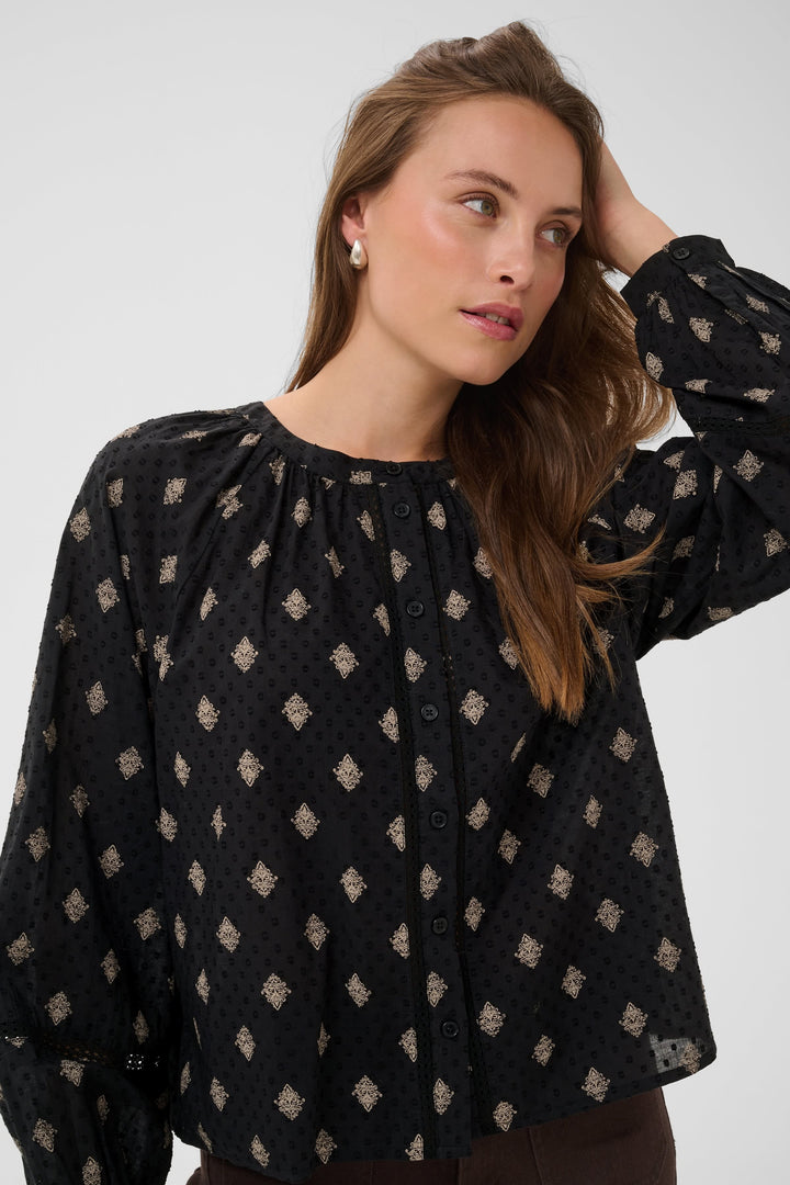 Front view of the Wila blouse with puff sleeves in a pastel floral print by Kaffe for women - Valérie Simon