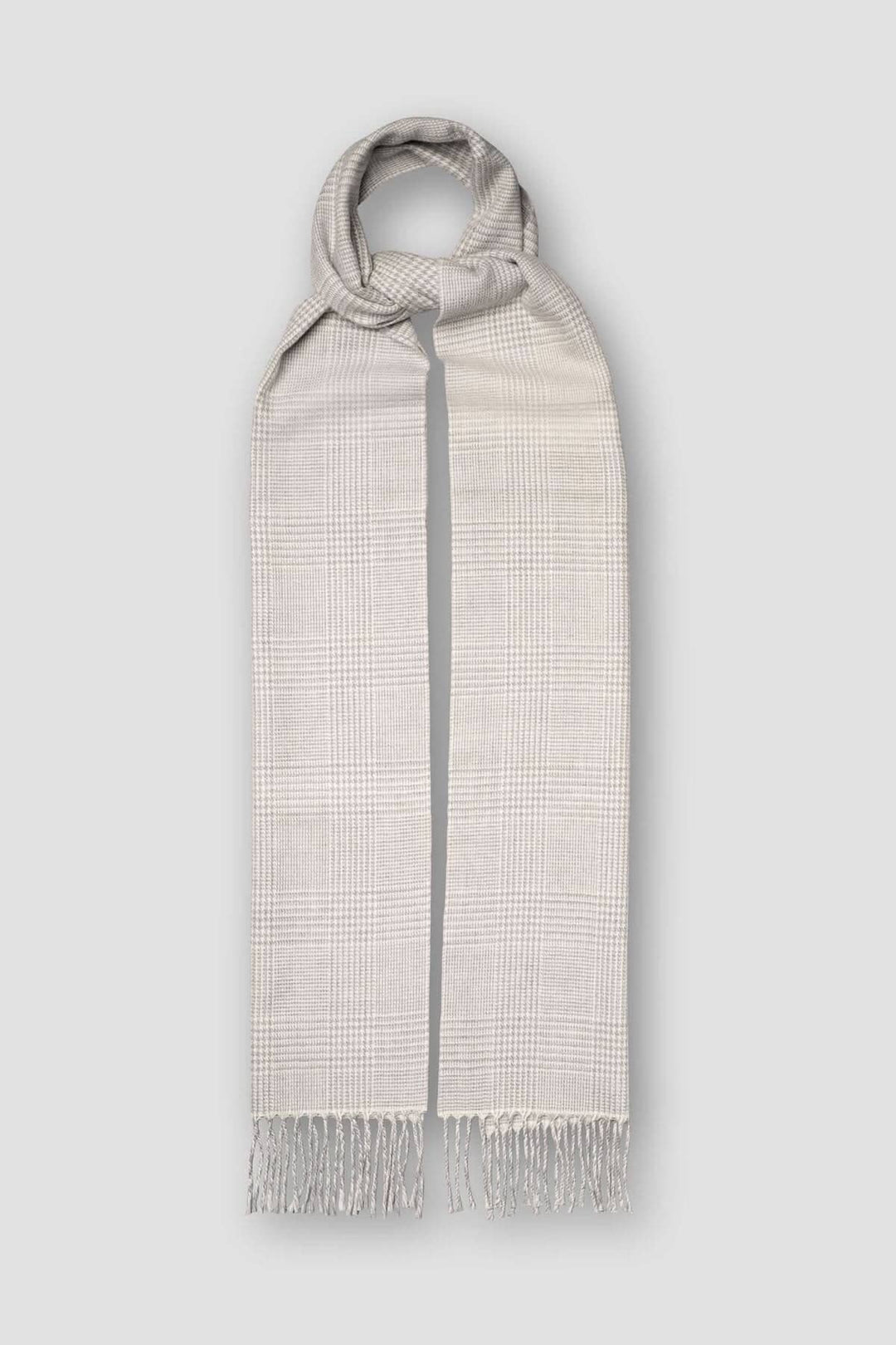 Foulard en laine Prince de Galles à carreaux gris clair et blanc, avec franges élégantes.