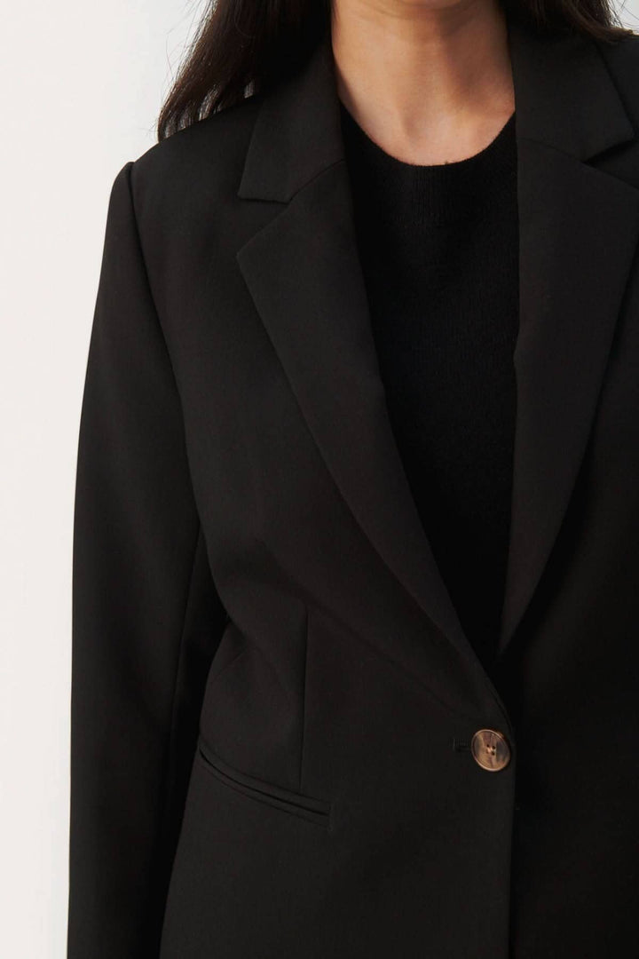 Veston classique Taylor noir à simple boutonnage et col haut pour un look chic et élégant.