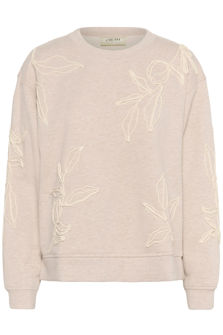 Chandail Lovisa en coton ouaté à broderies ton sur ton, floral design, ample coupe, beige sweatshirt.