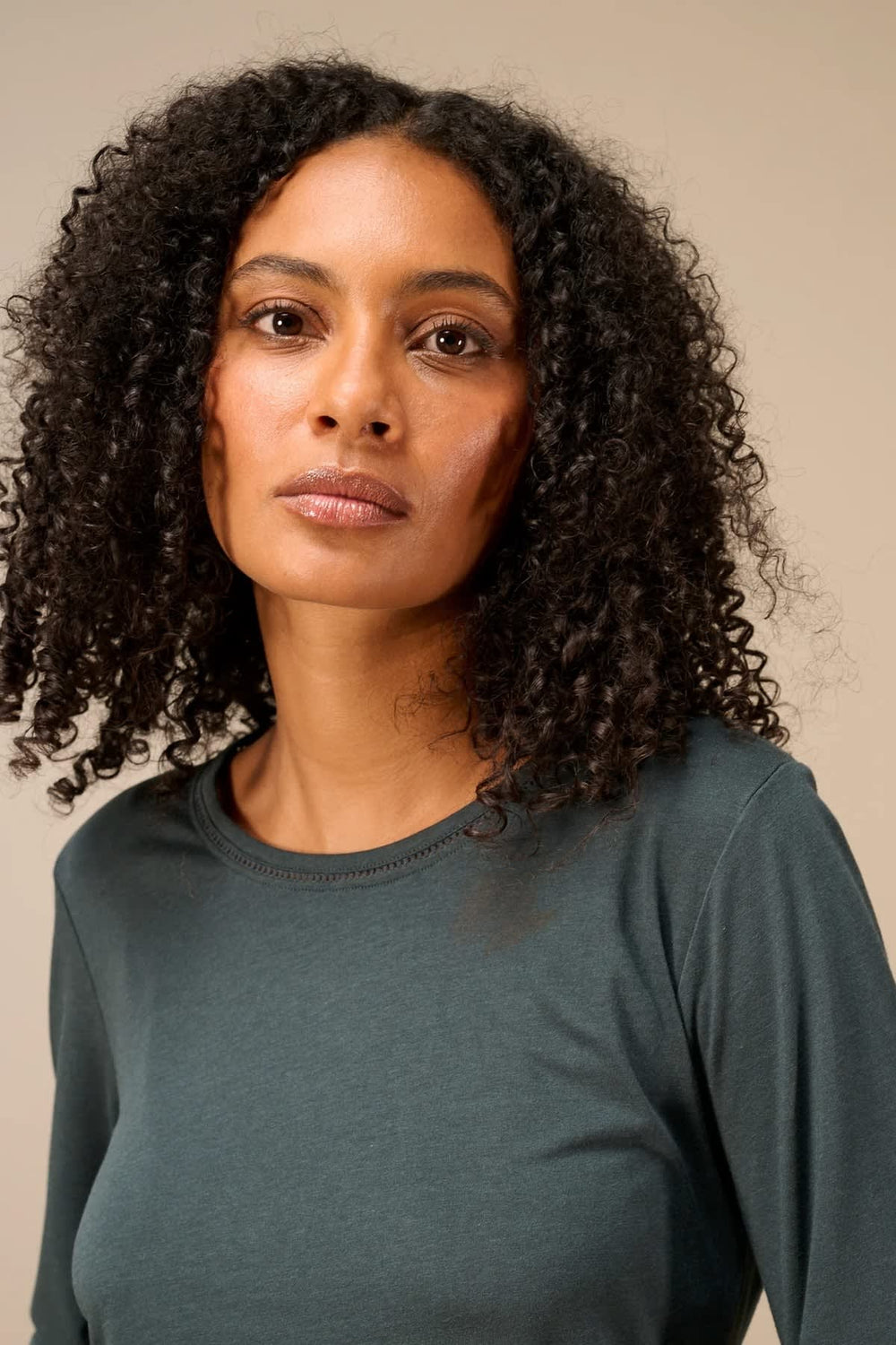 Front view of the Nile women's long-sleeve sweater with a delicate neckline