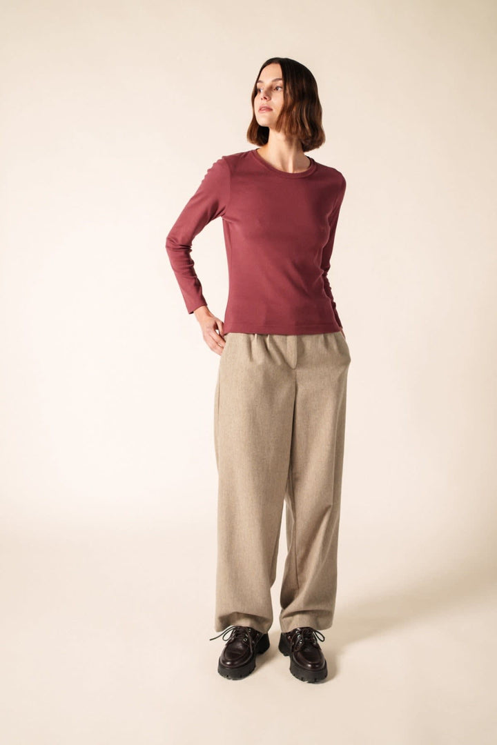 Side view of the CELINA U Saint James burgundy sweater with white stripes - Valérie Simon