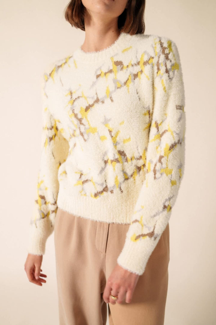 Vue de dos chandail en jacquard Saint James bordeaux avec motifs uniques pour femme - Valérie Simon