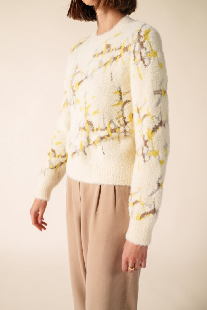 Vue de face chandail en jacquard Saint James rouge avec motifs uniques pour femme - Valérie Simon