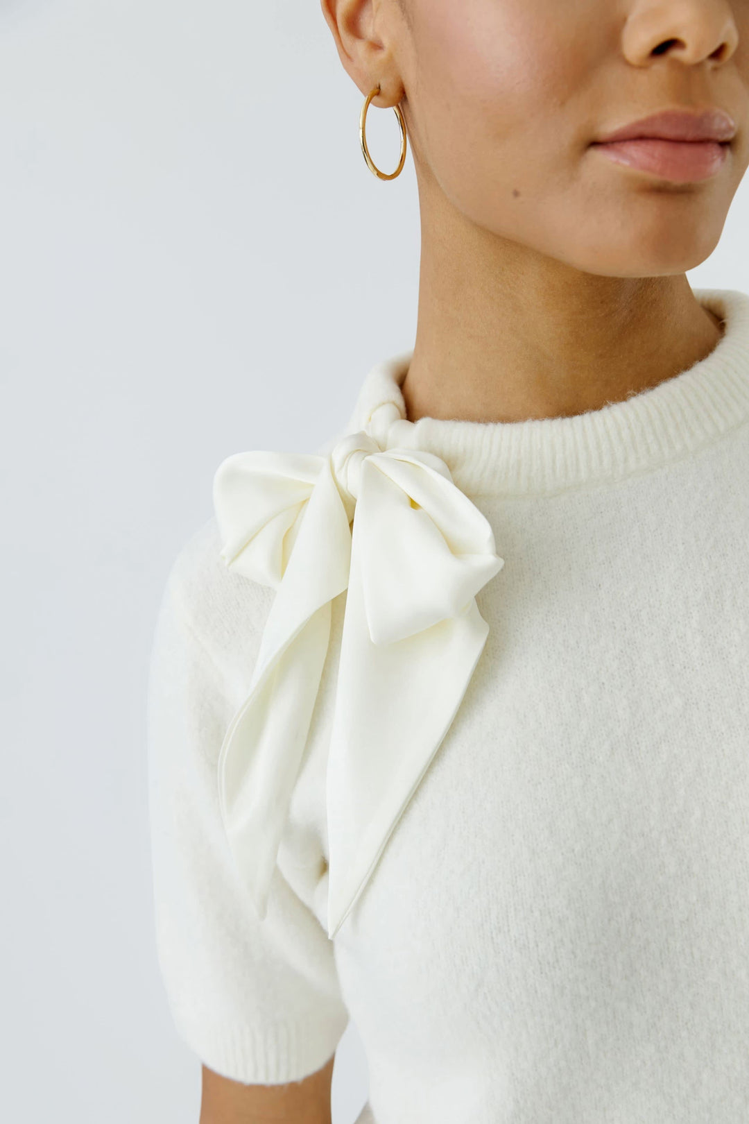 Vue de face chandail boucle Oui pour femme beige - Valérie Simon