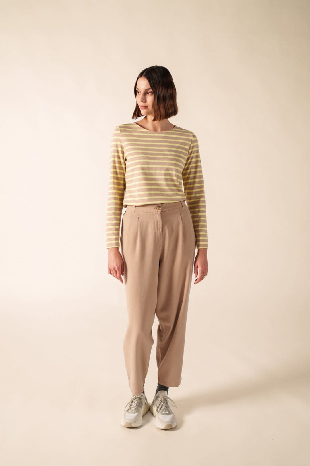 Front view of a white and blue striped women&