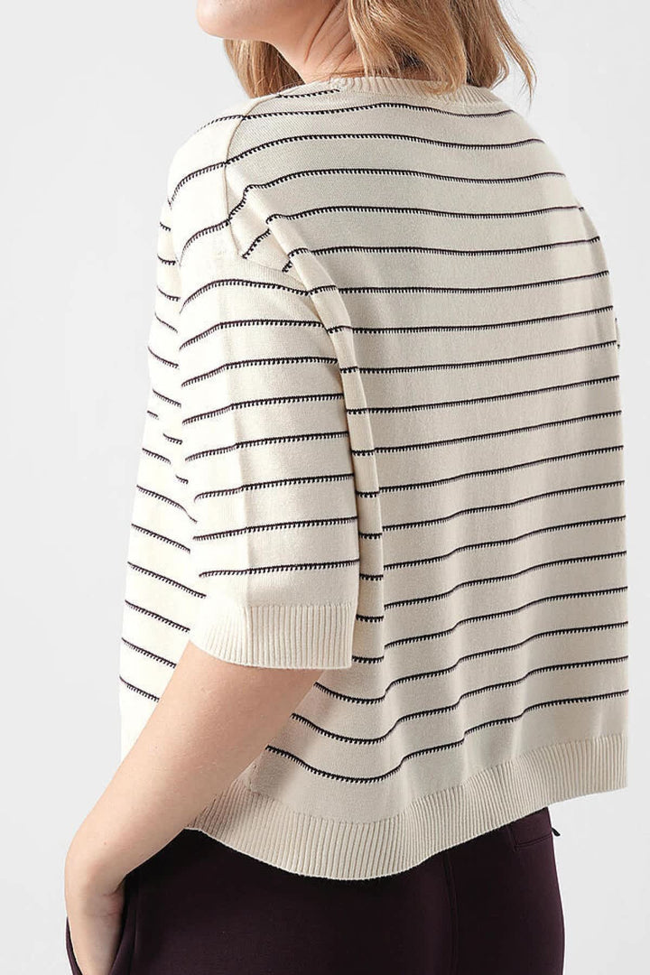 Front view of a colorful striped women&