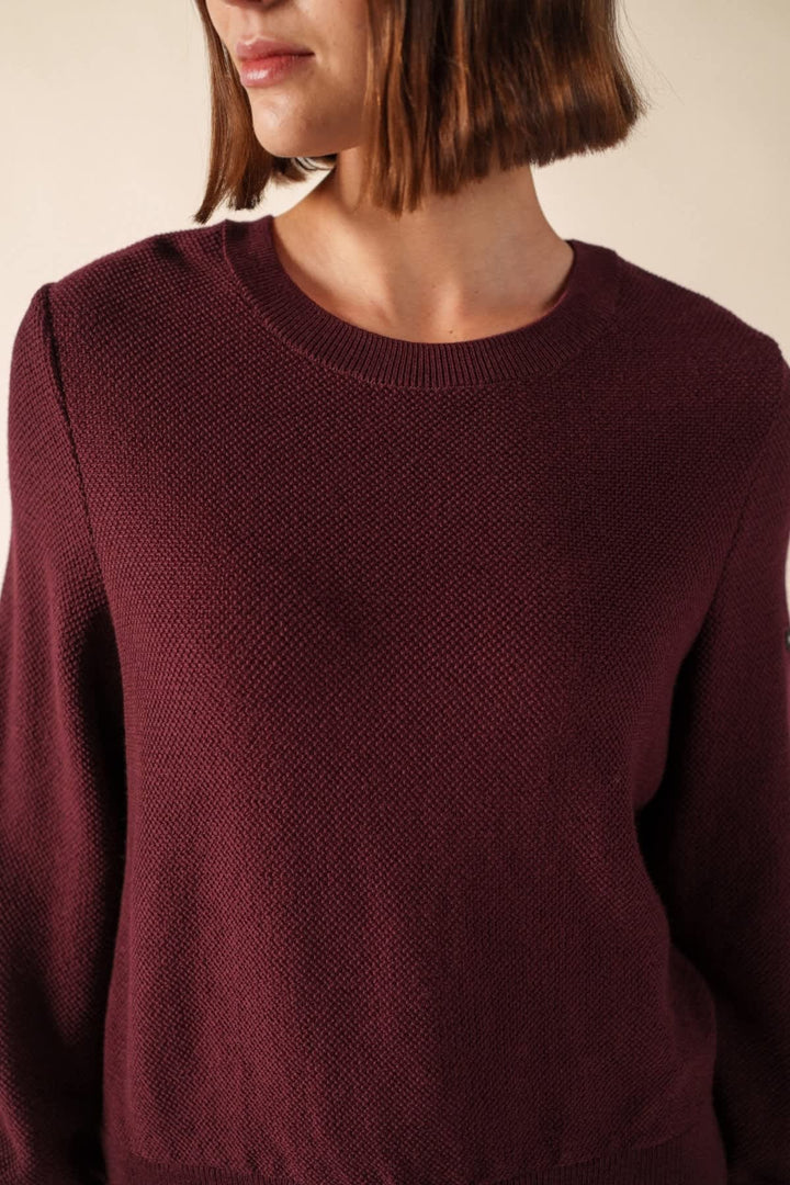 Side view of a light blue Saint James sweater with a striped pattern - Valérie Simon