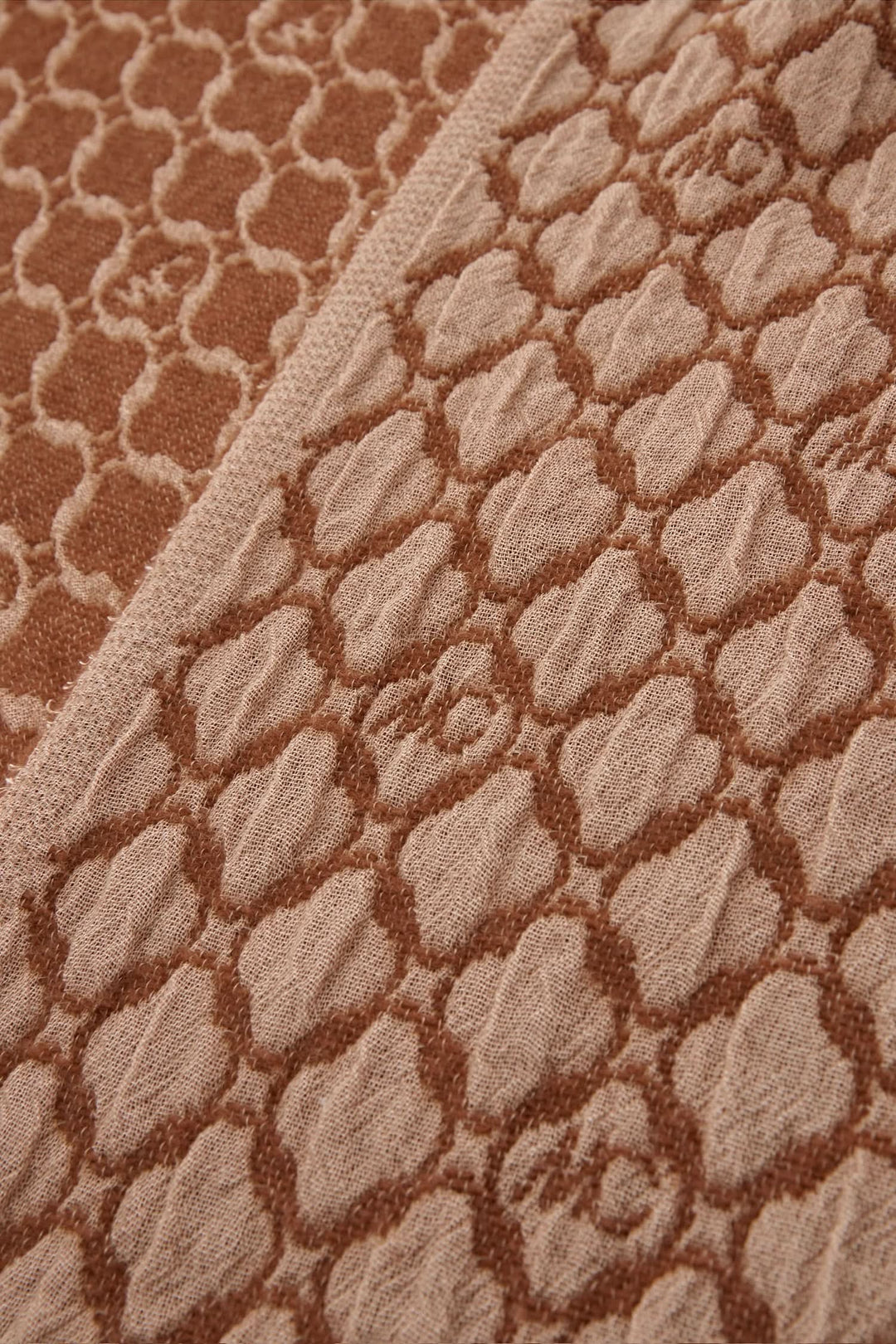 Tissu en laine double face bicolore avec motif textured, couleur beige et marron.