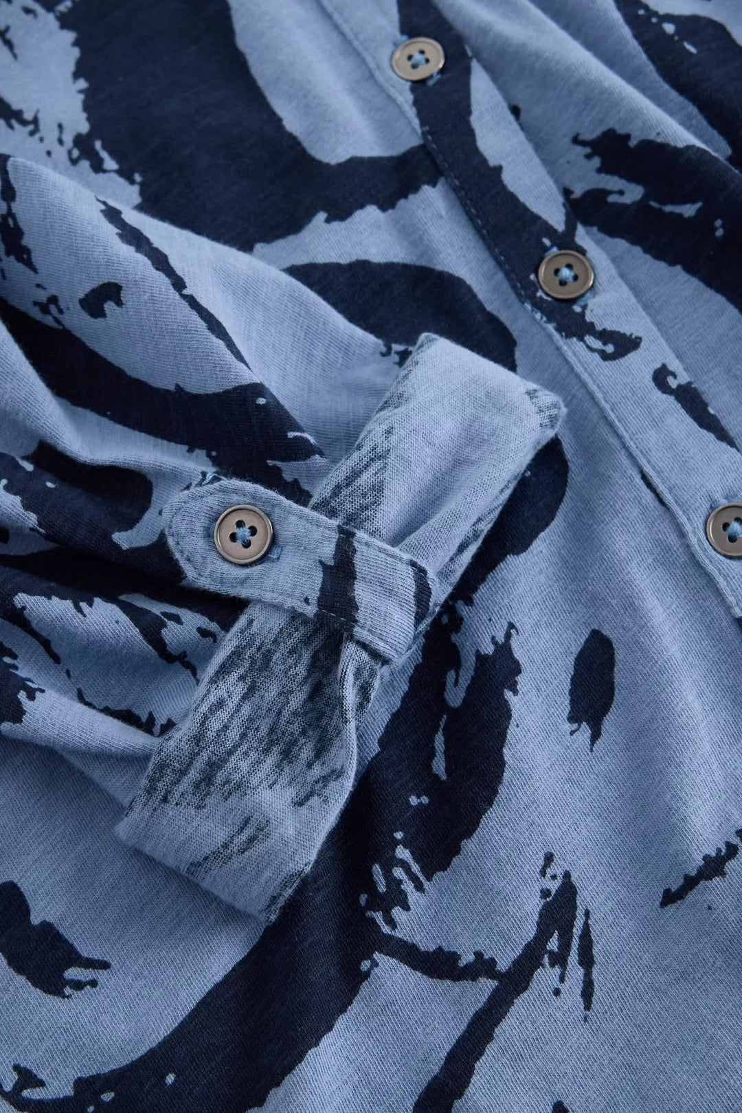 Detail view of the Valérie Simon blouse, abstract print shirt in green and blue for women White Stuff