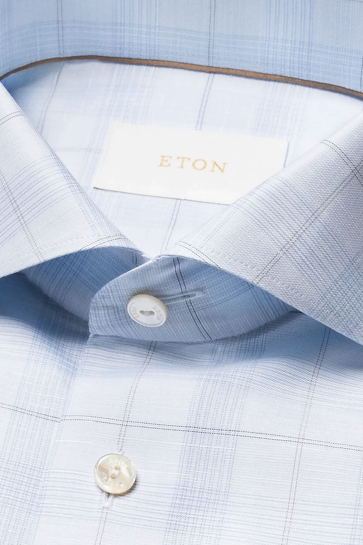 Close-up of a subtle blue Eton checkered men&