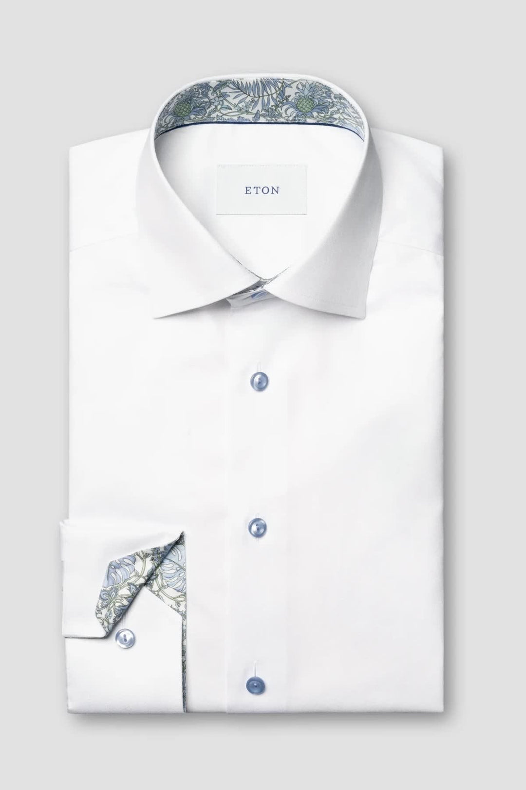 Front view of a white Eton dress shirt for men with contrasting details - Valérie Simon