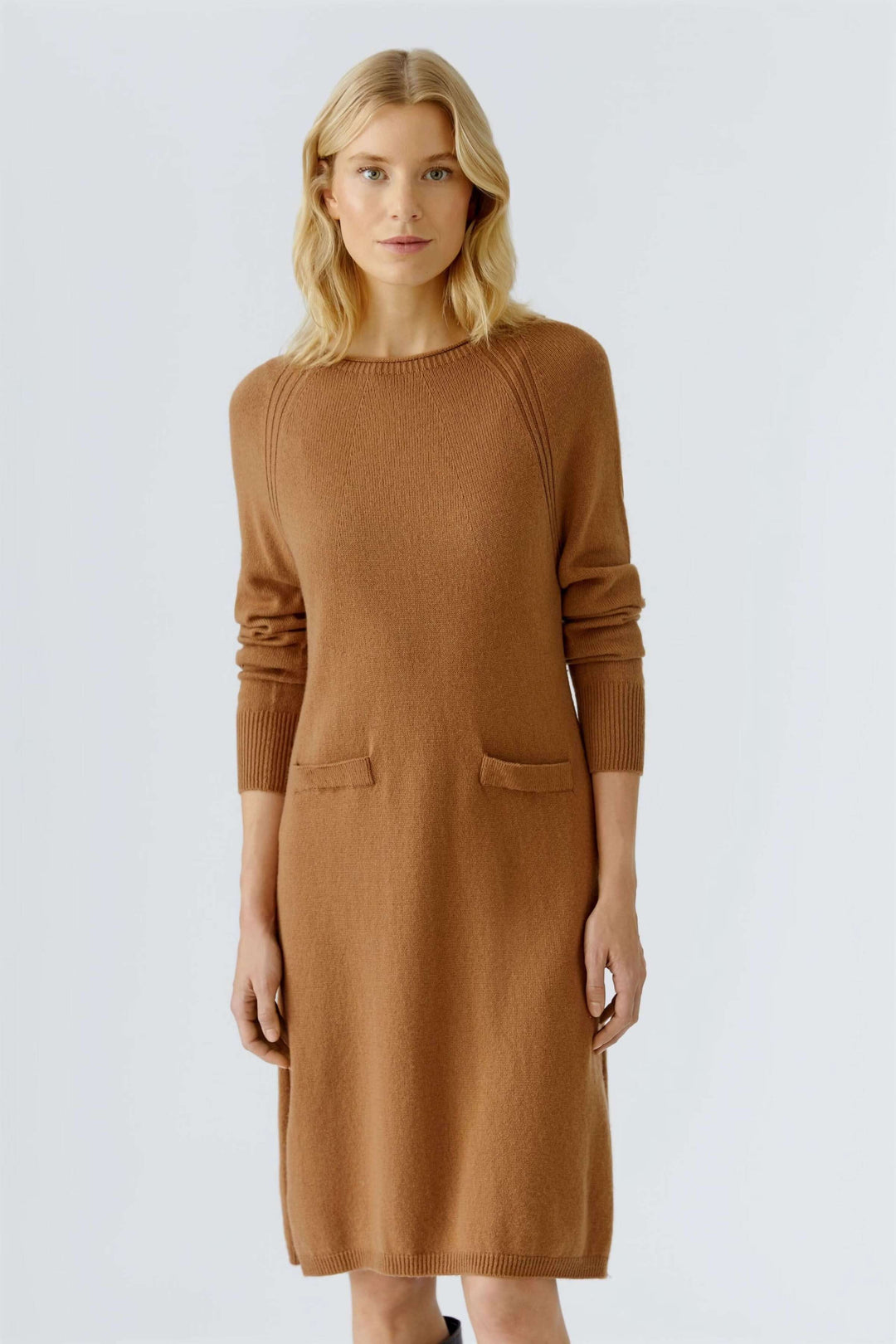 Robe tricotée à manches longues et poches plaquées