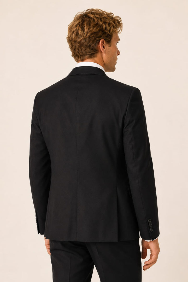 Full front view of the Tagliatore in brown wool with buttons and visible pockets - Valérie Simon