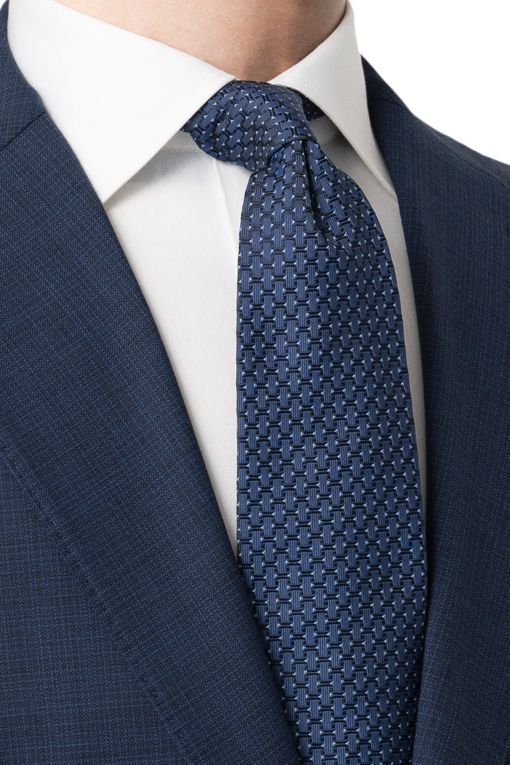 Detailed view of Eton blue geometric silk tie for men - Valérie Simon