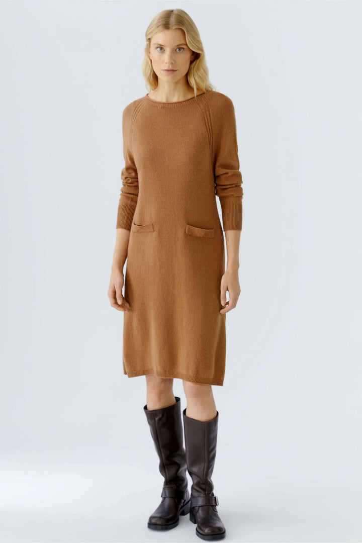 Robe tricotée à manches longues et poches plaquées