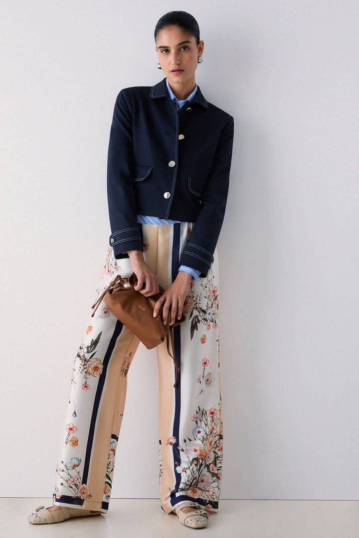 Pantalon fluide à motifs et rayures contrastées