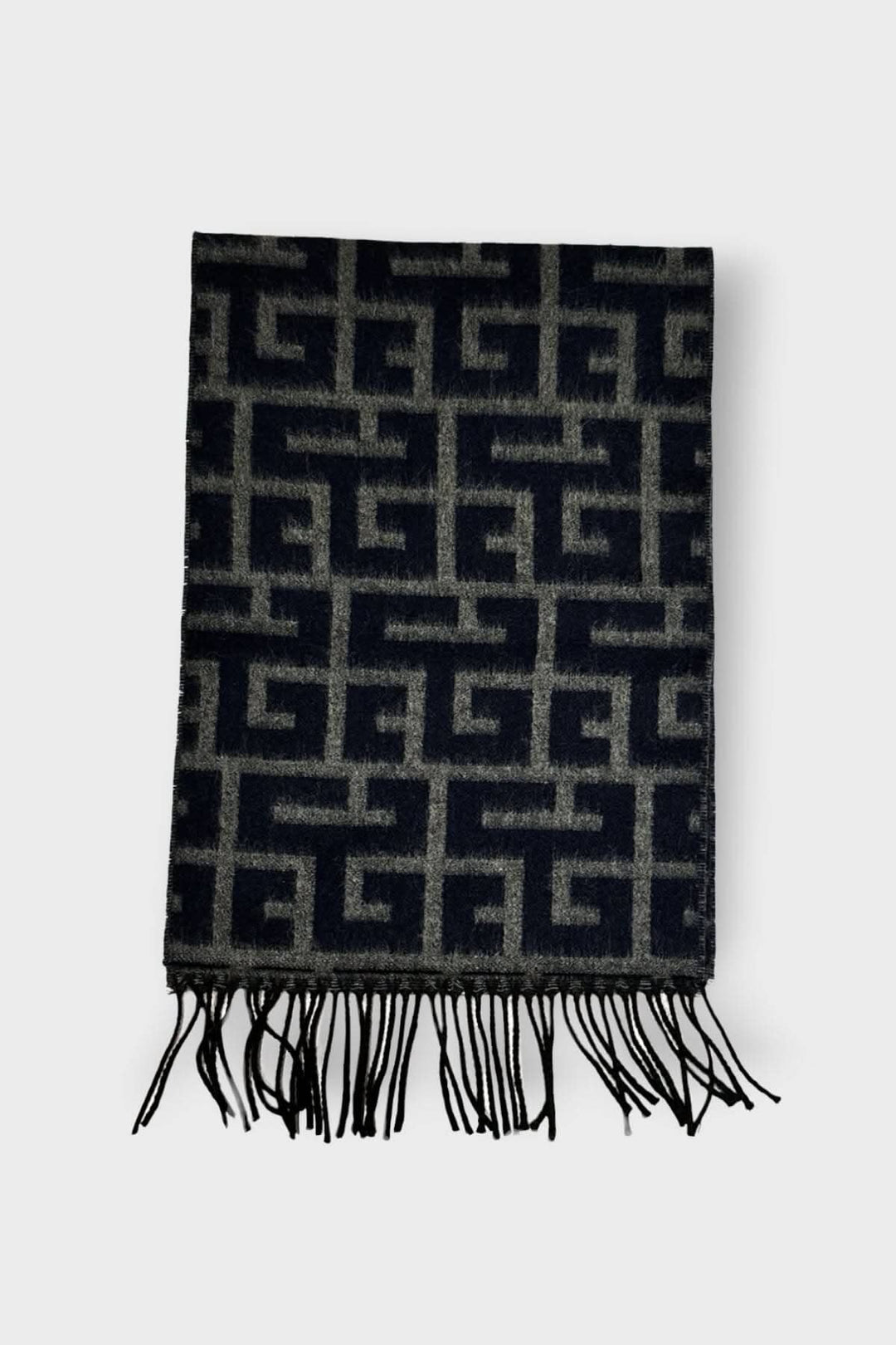 Foulard à motifs géométriques en cachemire, avec franges, élégant et luxueux, disponible en couleur sombre.
