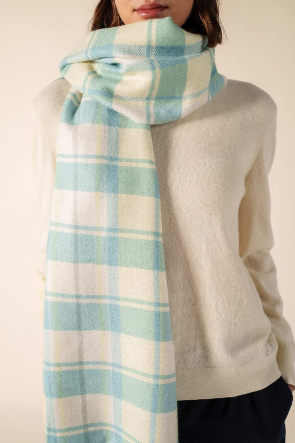 Side view of a red Saint James plaid scarf for women - Valérie Simon