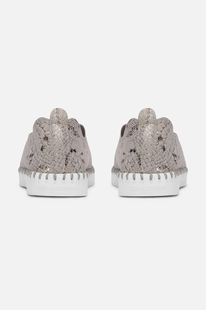 Chaussure légère en imprimé peau de serpent avec semelle en caoutchouc, confort et style pour toutes les occasions.