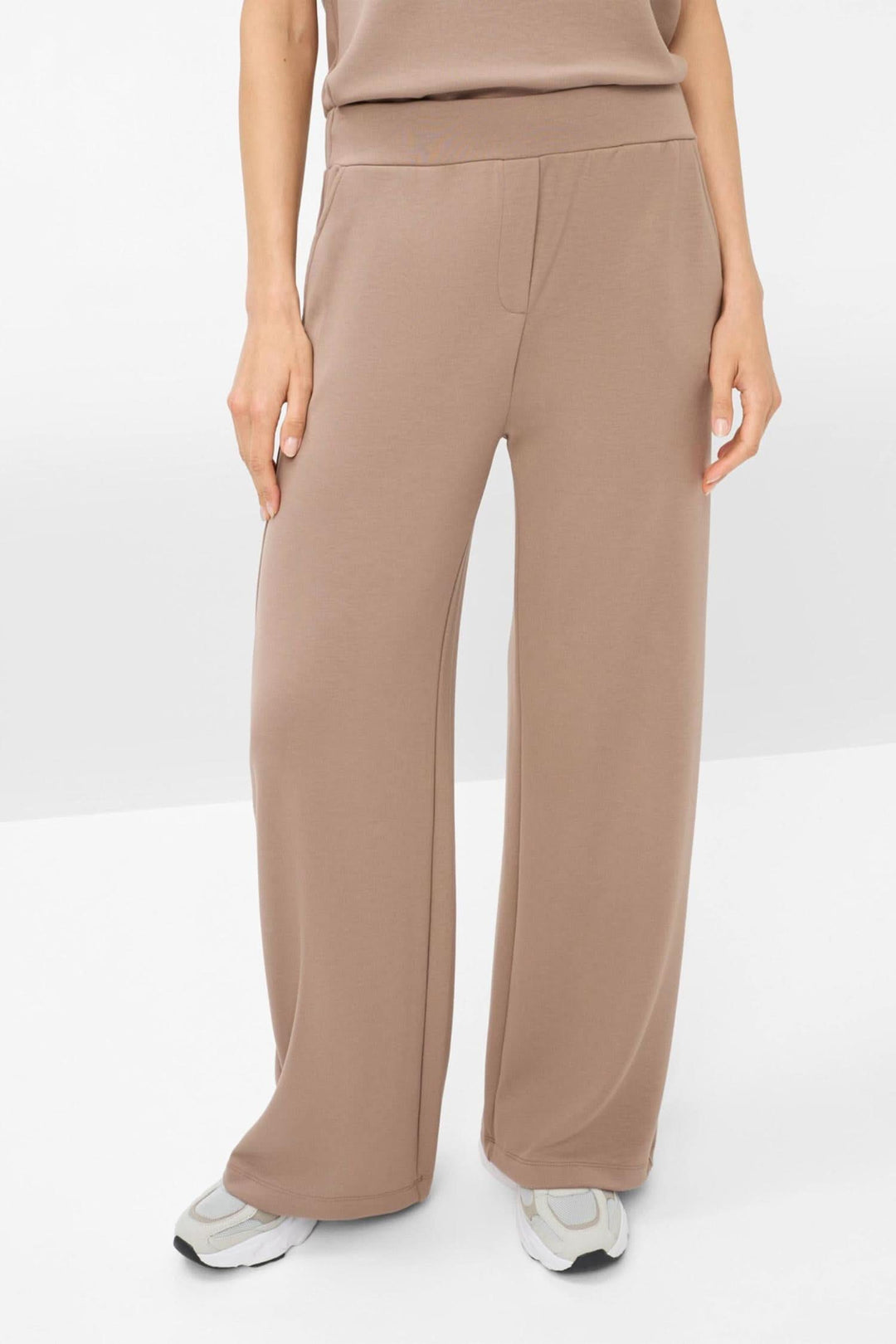 Pantalon palazzo Maine en beige à jambe large, taille élastique, style décontracté et moderne.