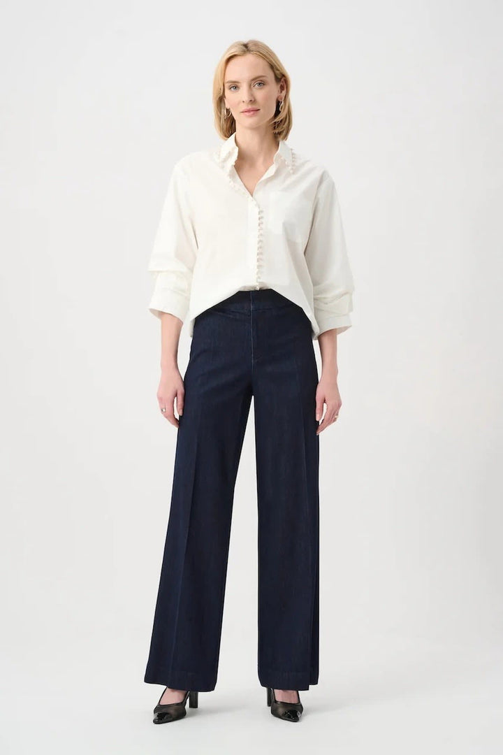 Side view of black Joseph Ribkoff wide-leg jeans with exposed seams - Valérie Simon