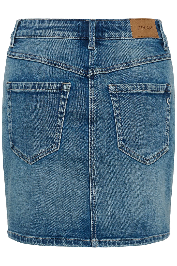 Front view of a short blue denim skirt with exposed seams Cream for women - Valérie Simon