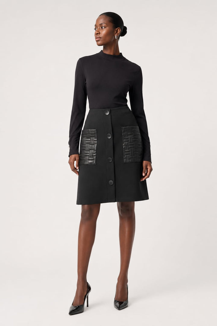Front view of a textured, pocketed Joseph Ribkoff skirt for women in black - Valérie Simon