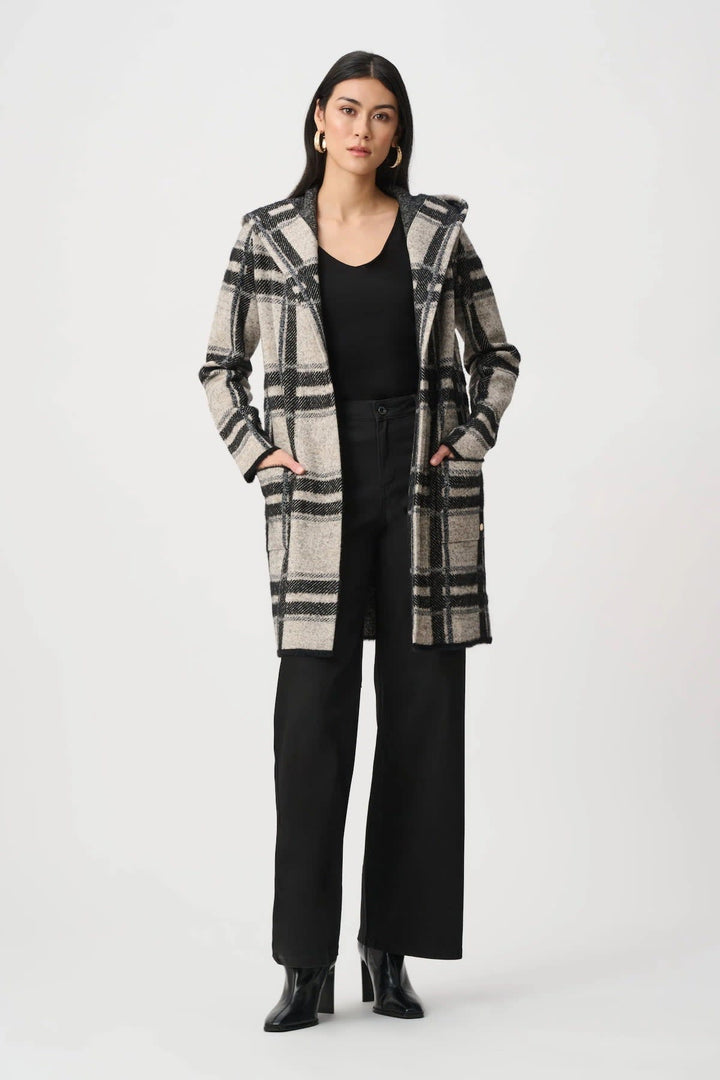 Front view of a black-and-white Joseph Ribkoff plaid coat with a hood for women - Valérie Simon