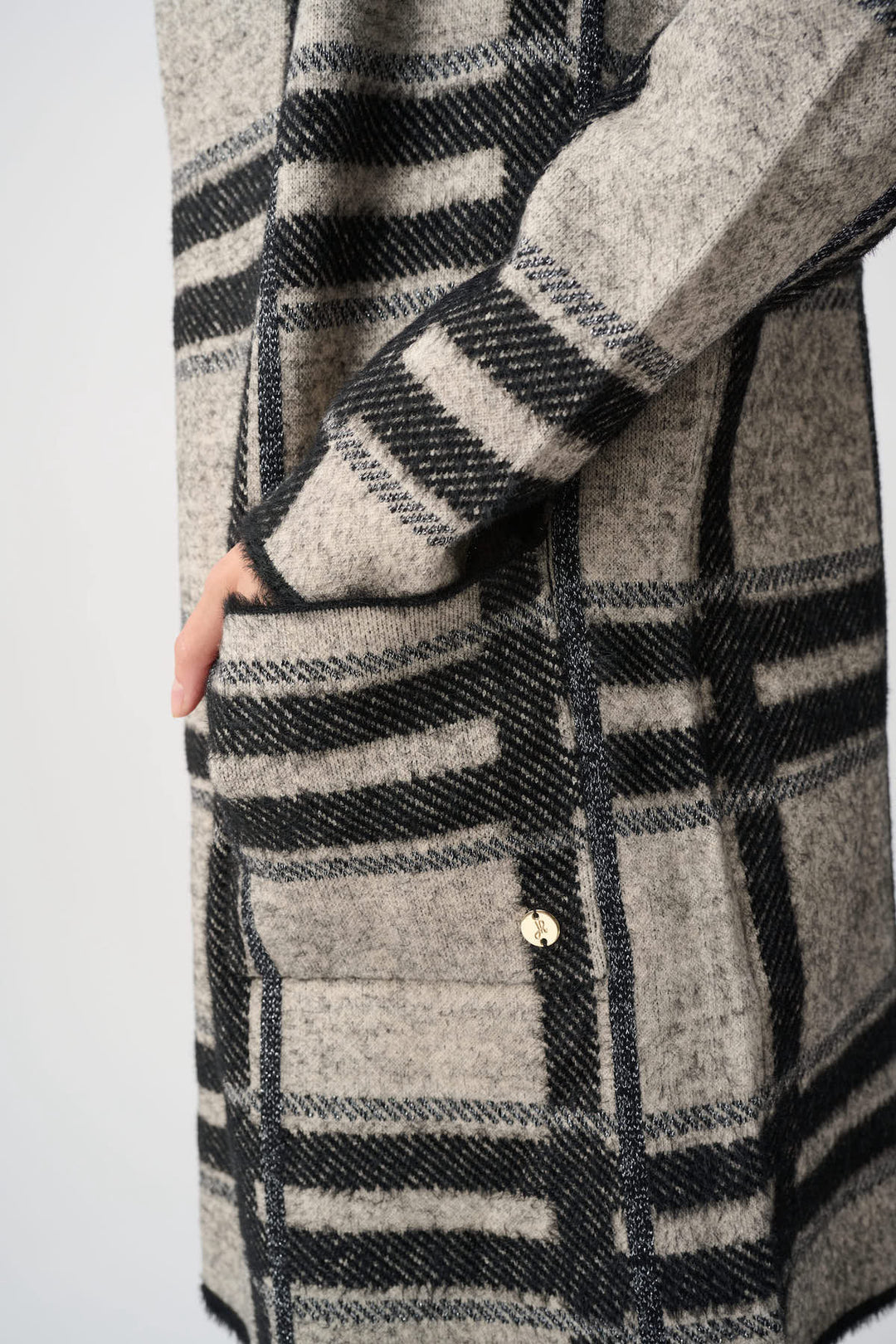 Front view of a Joseph Ribkoff plaid coat with a black-and-white hood for women - Valérie Simon