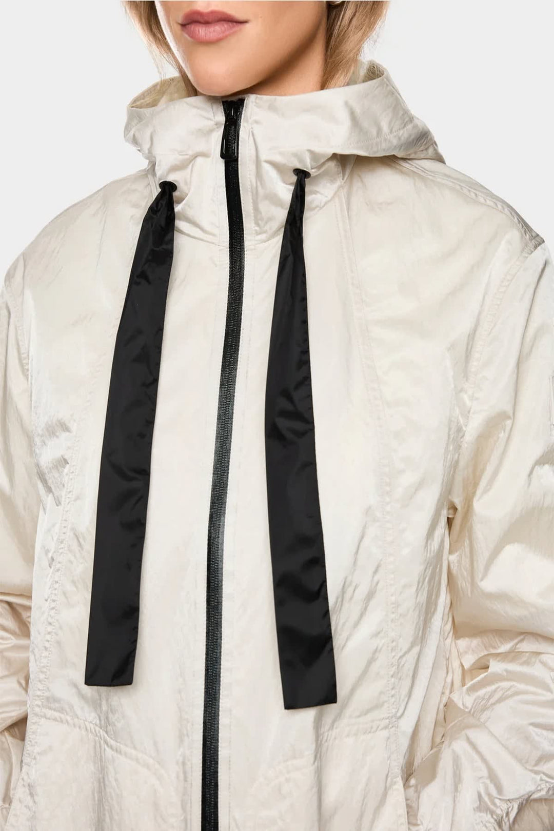 Front view of the Fit black Marc Cain hooded windbreaker with zipper details - Valérie Simon
