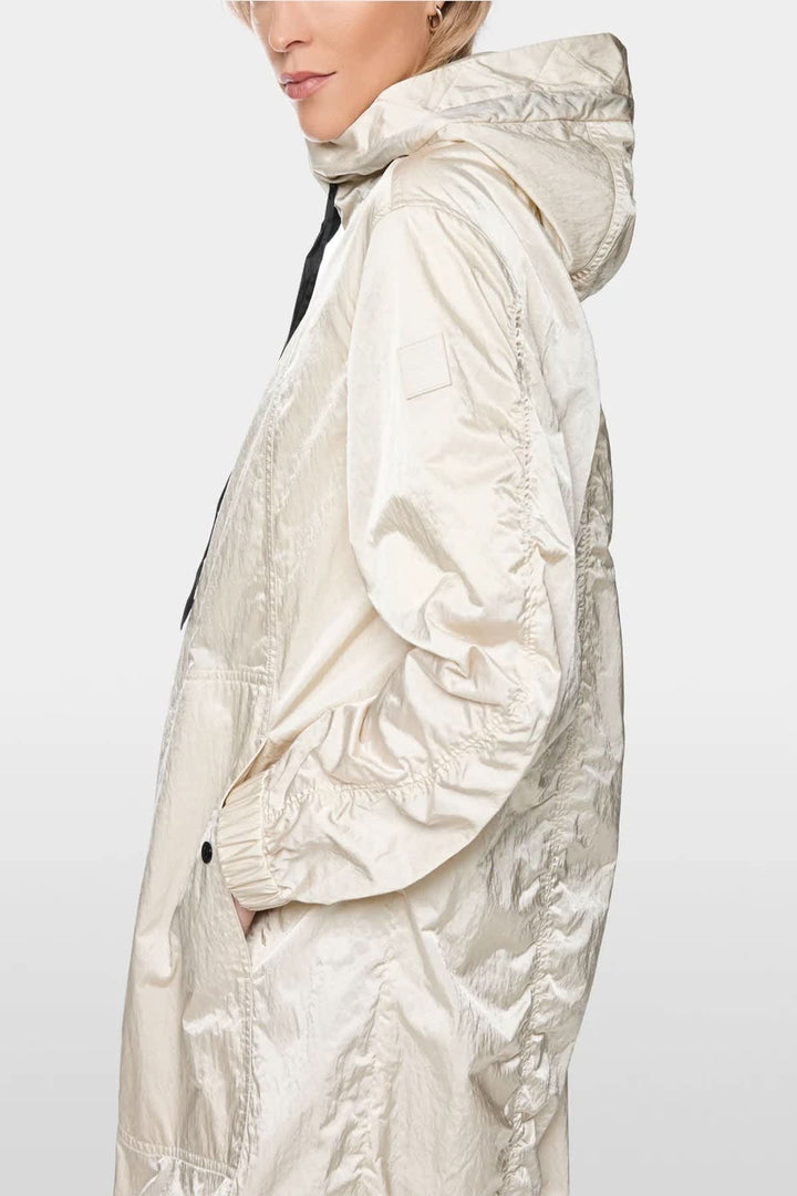 Side view of a beige Marc Cain women&