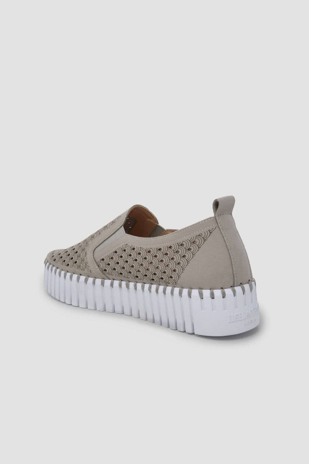 Chaussure Tulip, plateforme à semelle extérieure emblématique avec tige en microfibre découpée au laser et soufflets élastiques.