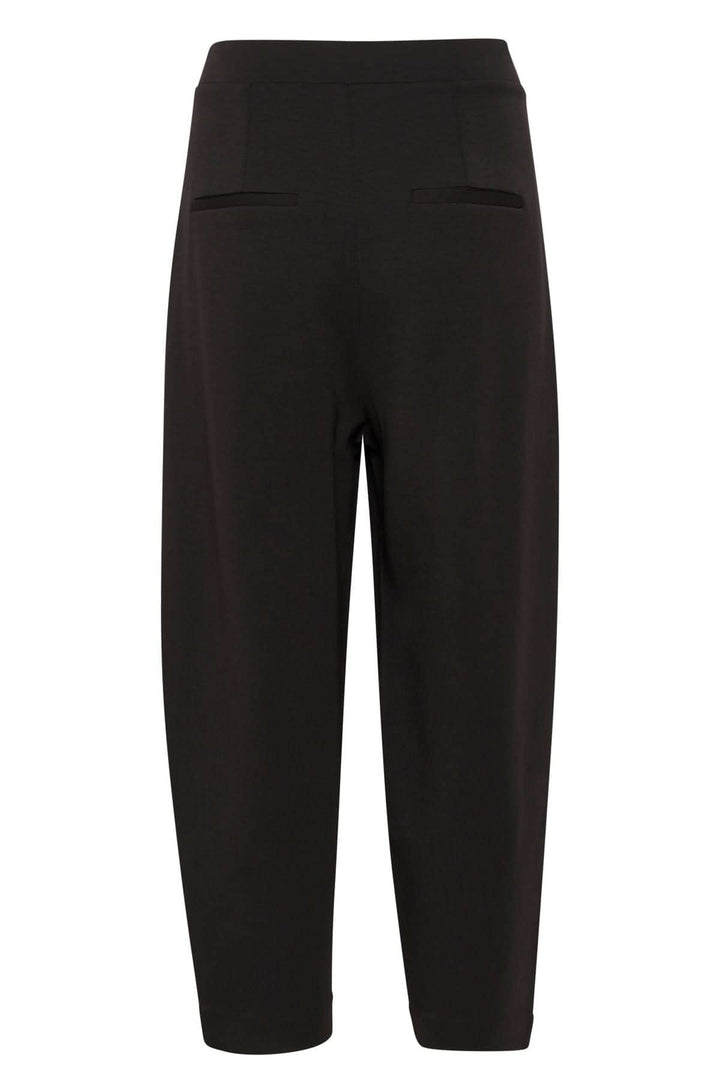 Pantalon Pannie à coupe décontractée noir, taille régulière, avec poches et pli à l'avant.