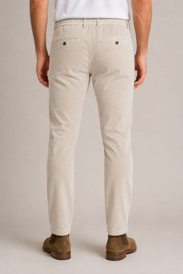 Side view of brown Paul and Shark corduroy chinos with side pockets and stitching details - Valérie Simon