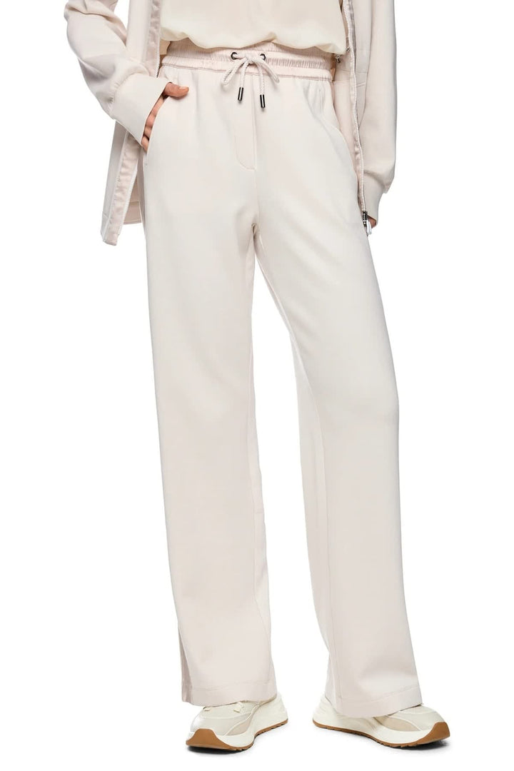 Side view of Marc Cain black casual pants with satin stripes for women - Valérie Simon